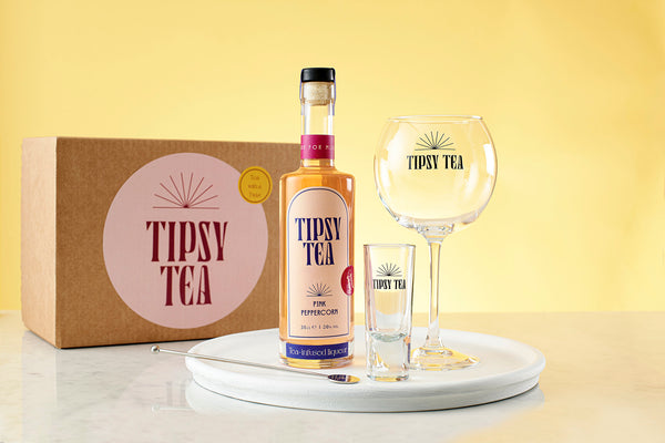 Gift set with glass measure tea liqueur